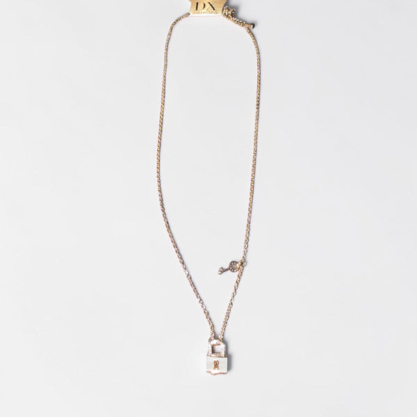 Tiny gold necklace with lock and key