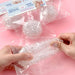 SNOW SQUISH – Clear Jelly Bead Stress Ball